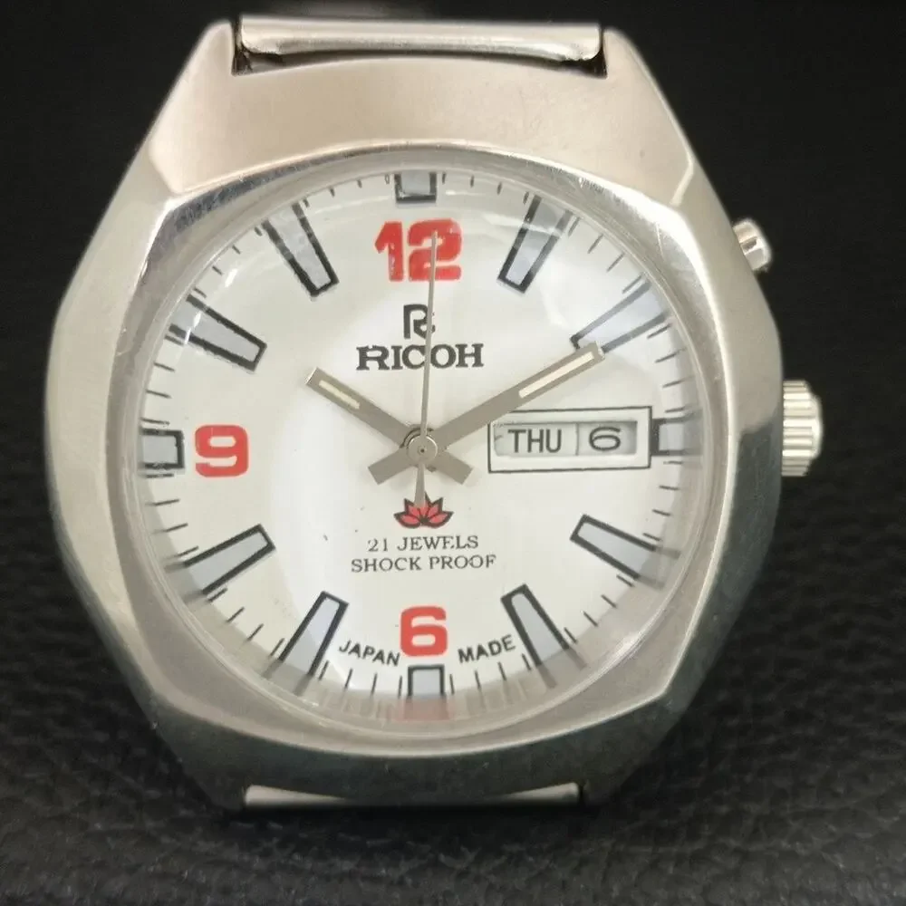 Vintage 1976 Ricoh Automatic Mens Silver Watch W/daydate & Red accents